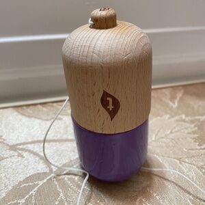 Wooden hand made skill toy.